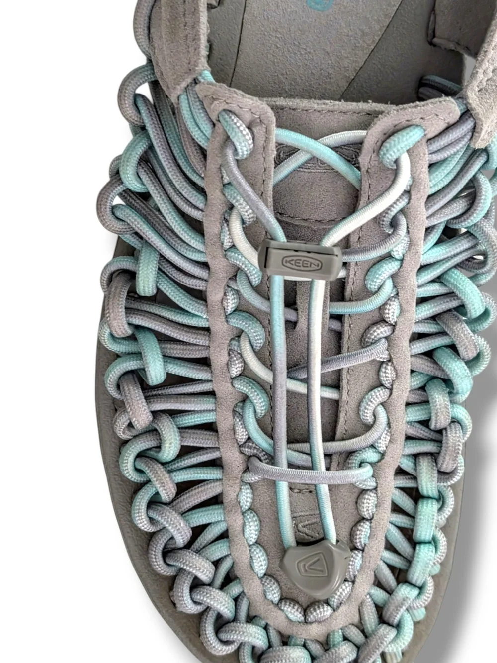 NWOT KEEN Women's Uneek open-air cord sandals in a grey and aqua blue colorway